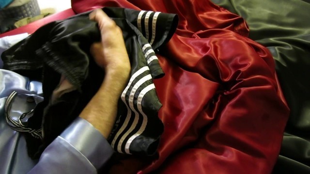 Playing in satin pajamas, satin sheets and Adidas shorts