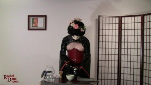 The latex concubine performs the Japanese Tea Ceremony