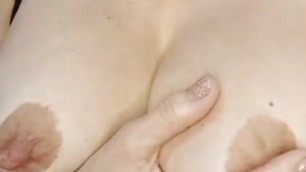 rubbing my huge tits and nipples in close-up